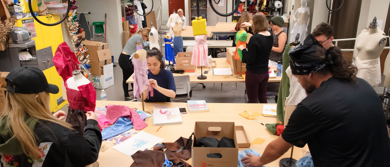 Theatre students hard at work in the costume shop during a Costume Design class