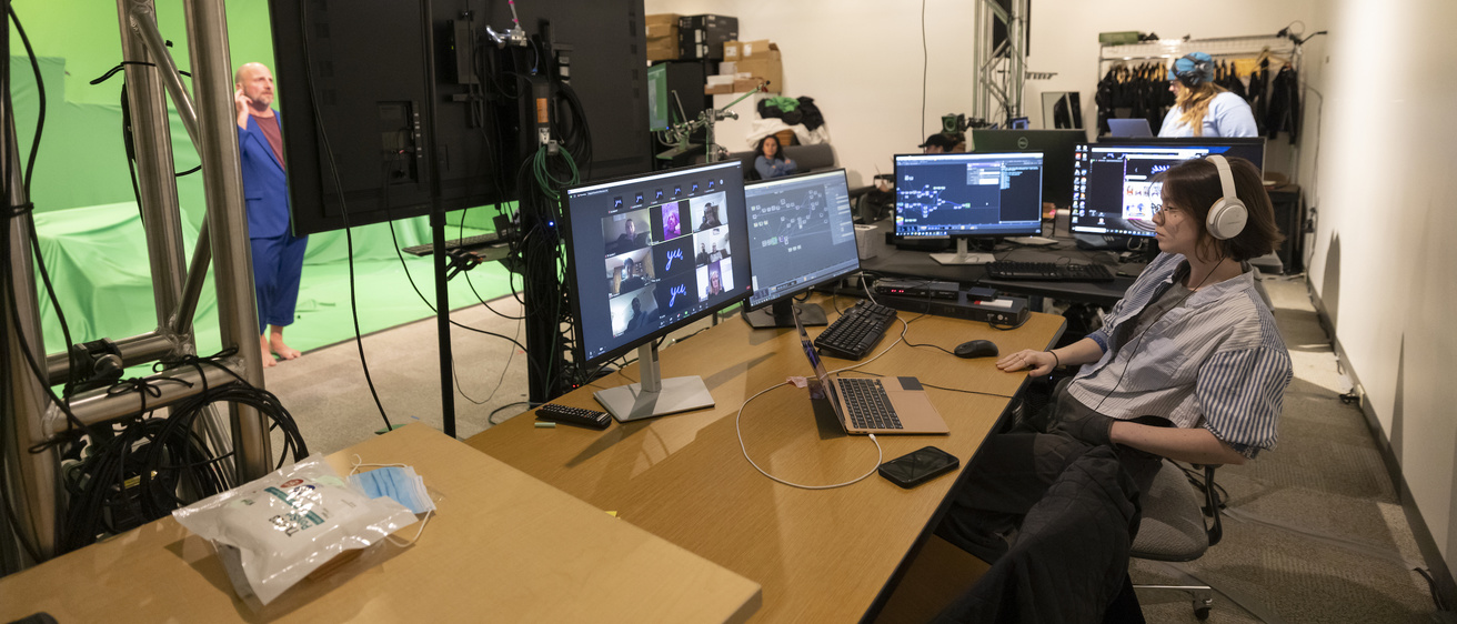digital media staff Emily Berkheimer at the controls in the motion capture studio