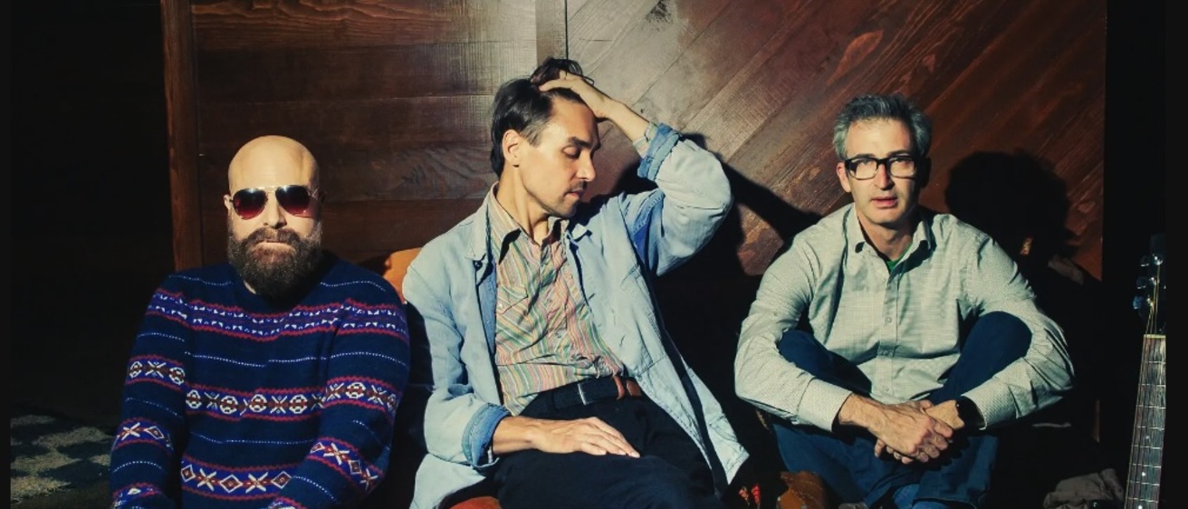 Adjmi, left, with the musician Will Butler and the director Daniel Aukin