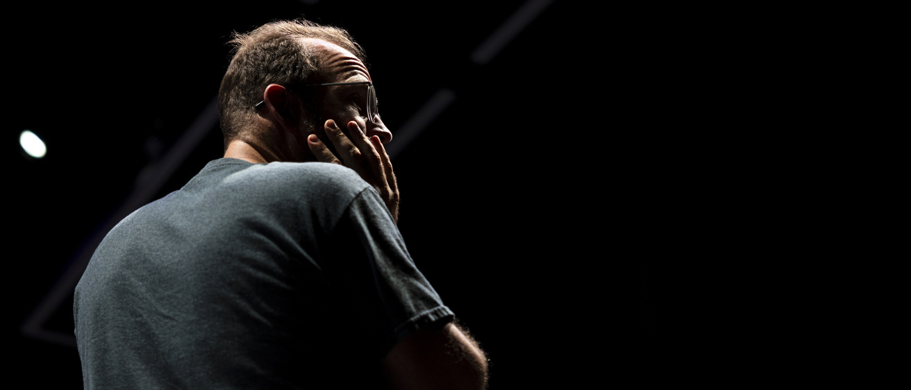 Director Søren Olsen looks around during a rehearsal of Romeo and Juliet at the University of Iowa Mabie Theatre on Wednesday, Oct. 1, 2025. Photo by Gabby Drees.
